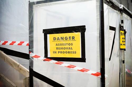 A plastic covered entrance to building undergoing an asbestos removal process.